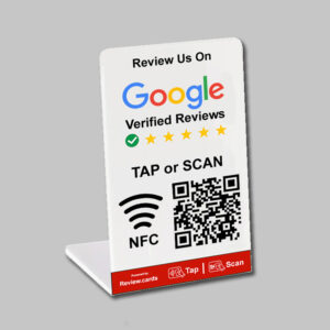 A standing sign prompting customers to "Review Us On Google Verified Reviews" with a 5-star graphic. It features a QR code, NFC symbol, and instructions to "TAP or SCAN" for reviews. The base showcases the Review.Cards logo alongside "Google Tap or Scan Stands - FREE Delivery" icons.