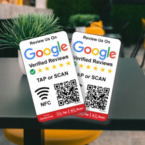 Two Smart Review Cards are displayed on a table, encouraging customers to review the business on Google Verified Reviews. Each card features the Google logo, five stars, and a QR code for scanning. An NFC symbol is also present, indicating tap functionality for reviews.